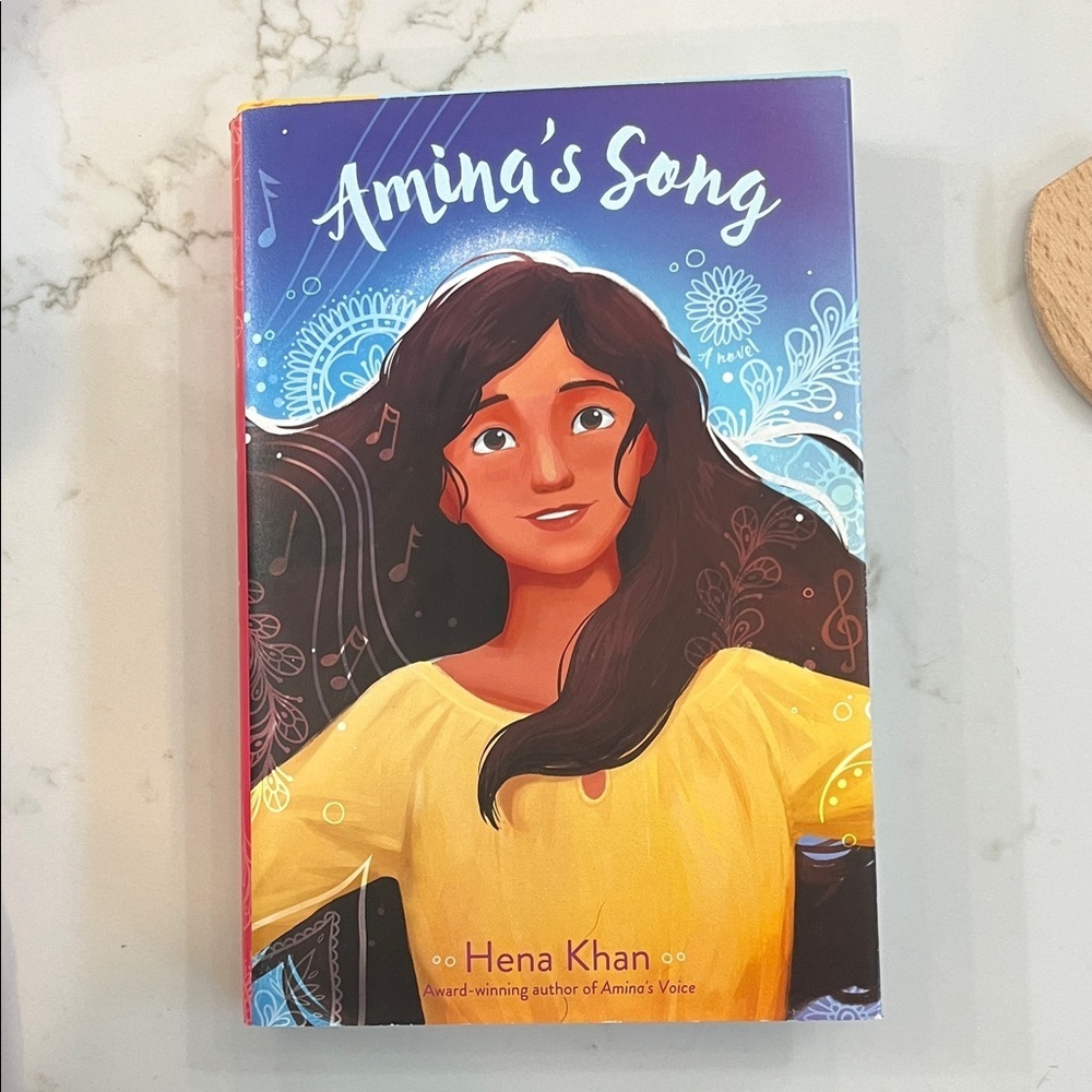 Amina's Song Book by Hena Khan